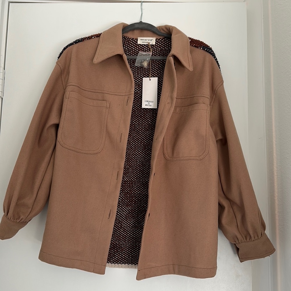 Coat with tribal design